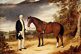 A Gentleman Holding a Chestnut Hunter in a Wooded Landscape by William Webb